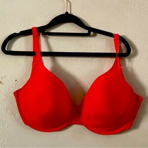 Skims bra in the color poppy